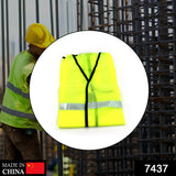 Green safety jacket for visibility and safety on construction sites