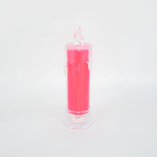 Detailed view of red LED flameless candle, highlighting its flickering light effect.