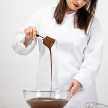 Silicone spatula in use for mixing and stirring