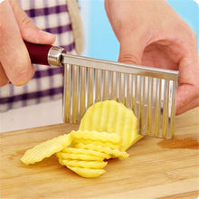 Durable crinkle-cut knife with a wavy blade for slicing potatoes into fun shapes.