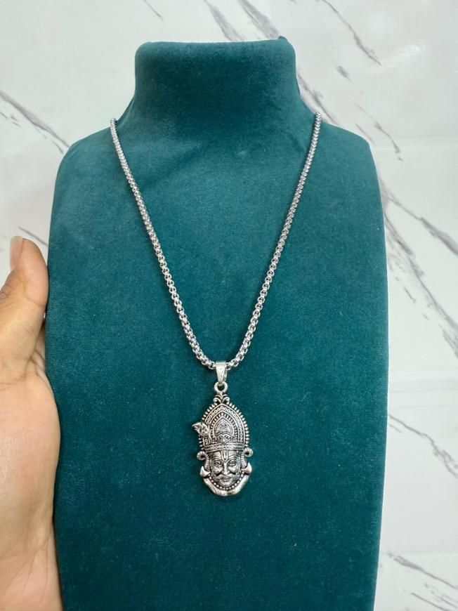 Shri Khatu Shyam Ji Maharaj Pendant with Chain displayed on a green mannequin.