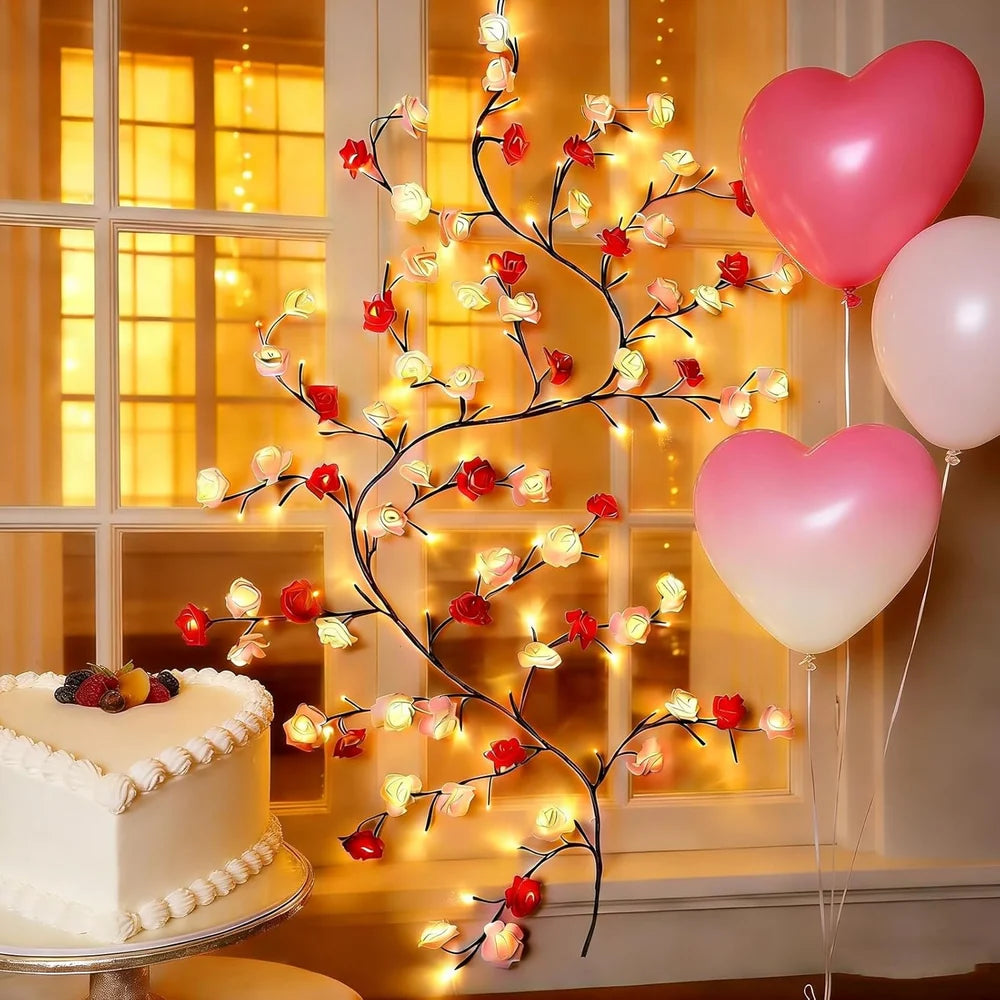 Rose vine LED branch light at birthday celebration heart balloons and cake warm multicolor rose glow 8 lighting modes