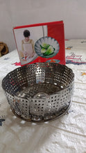 Stainless steel foldable basket for steaming and drying dishes.