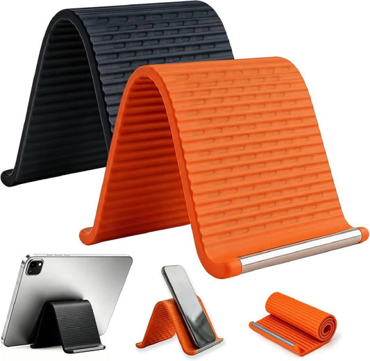Flexible foldable silicone phone and tablet stand in black and orange with aluminum core