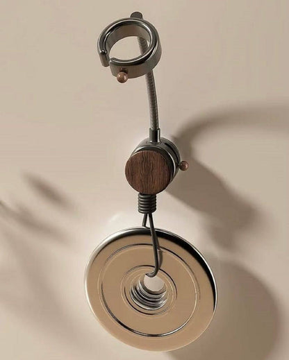 Hair dryer holder suction cup base with cord organizer and walnut wood detail close up
