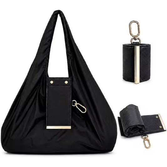 Foldable keychain tote bag in black with PU leather compact pouch and gold carabiner clip unfolded view
