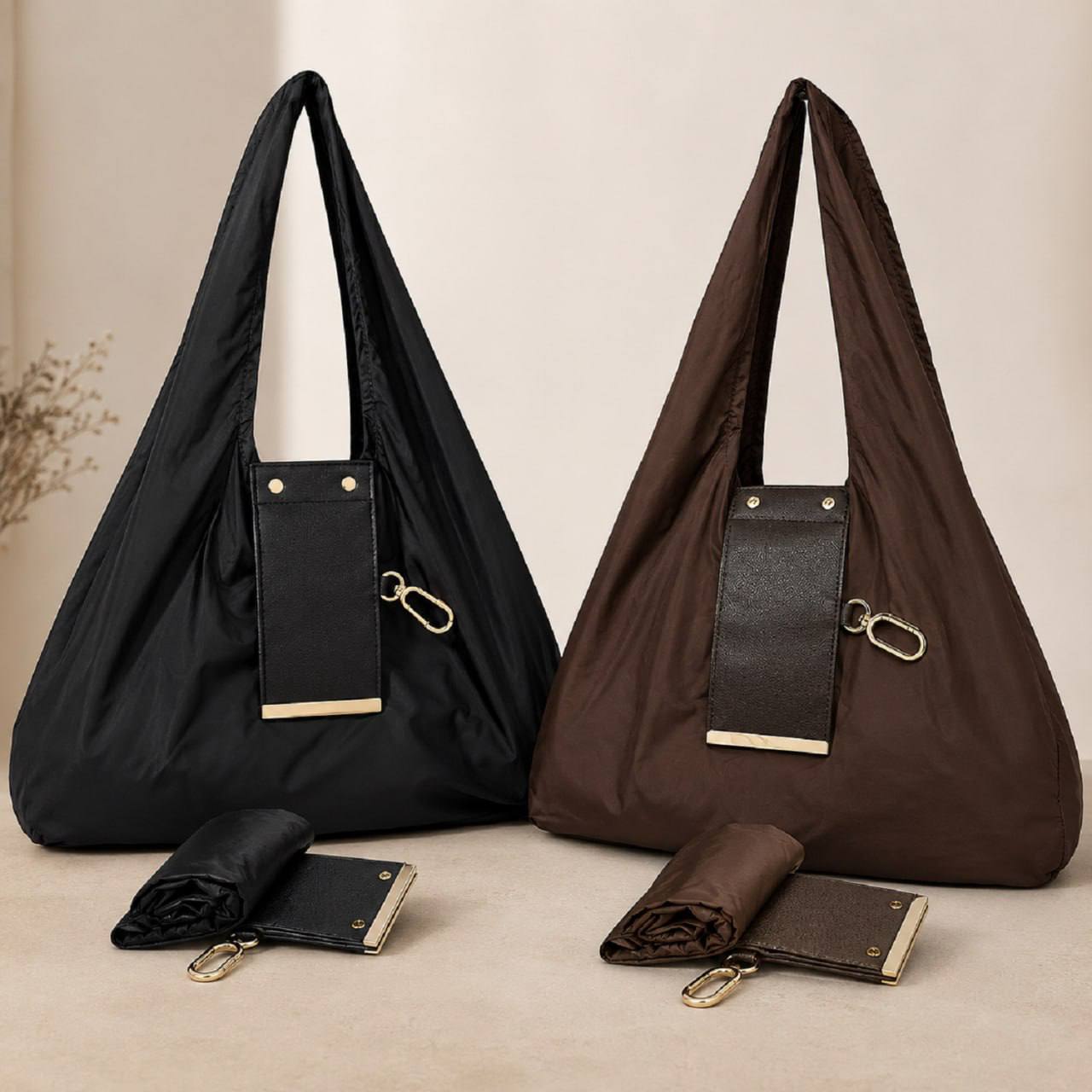 Foldable keychain tote bag available in black and brown colors shown side by side with compact pouch