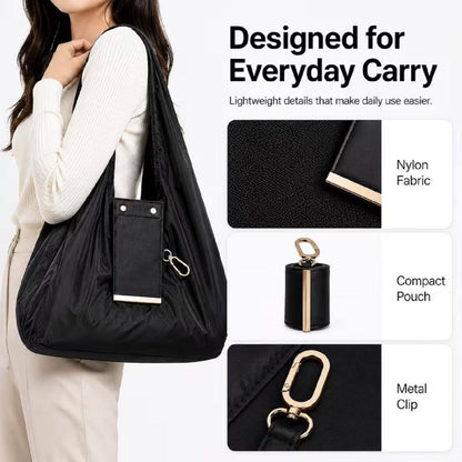 Foldable tote bag designed for everyday carry nylon fabric compact pouch and metal clip detail