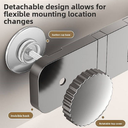 Invisible wall hanger folded flat against wall showing hidden foldable design in use