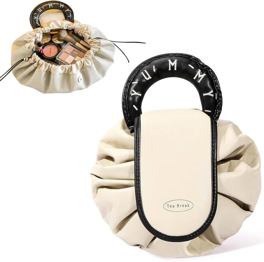 Lazy drawstring makeup bag brown beige PU leather with designer oval handle closed compact view