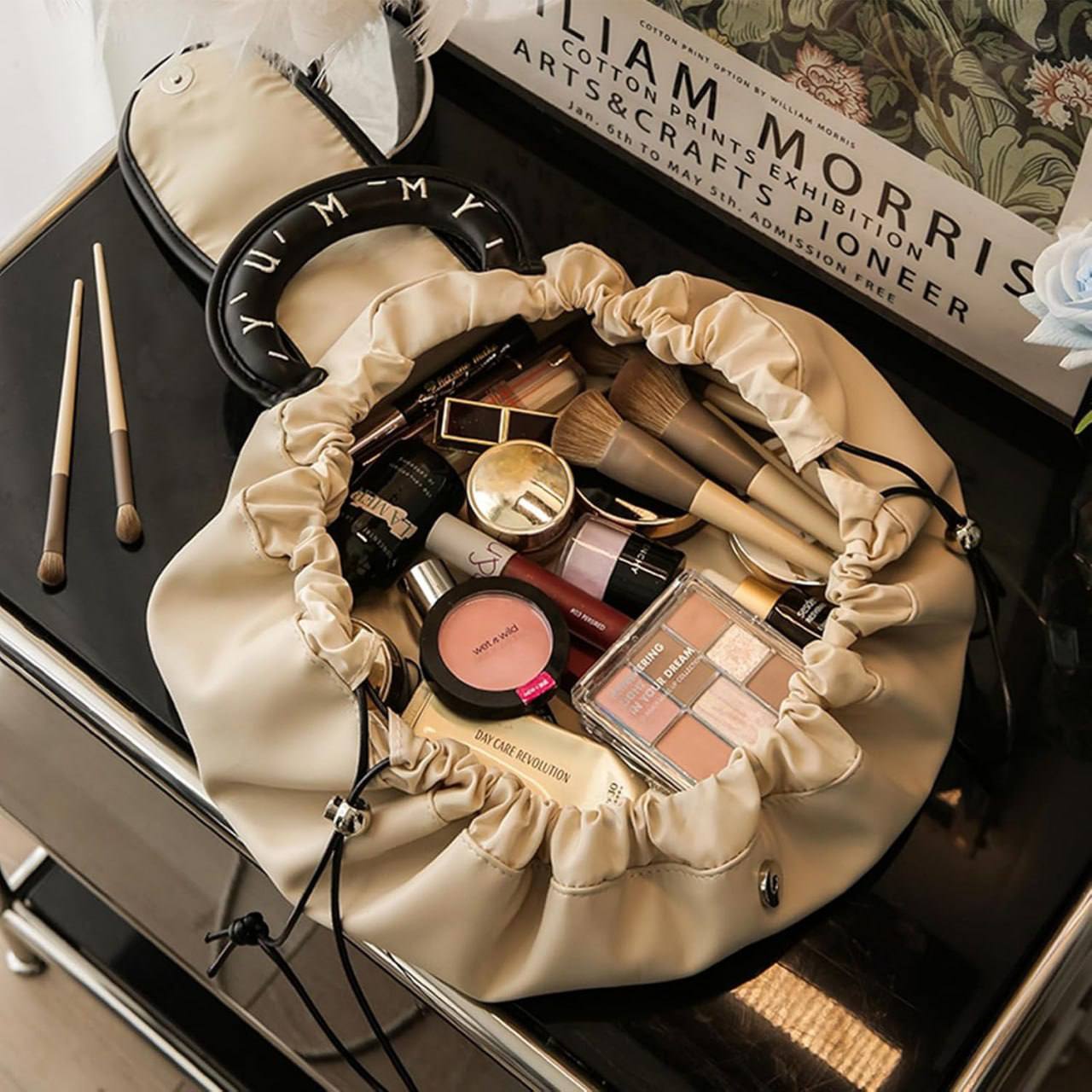 Lazy drawstring makeup bag open flat 360 degree view full makeup collection base lipstick brushes skincare